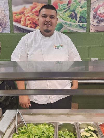 Chef Florentino 'Chef Flo' Gutierrez in the kitchen